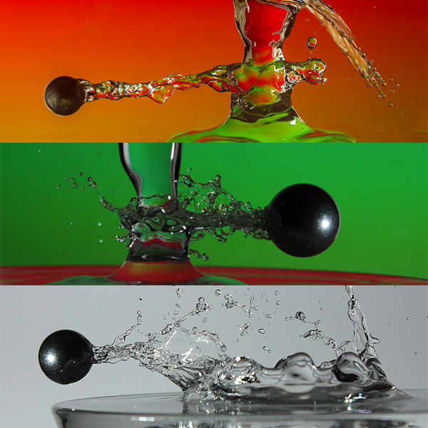 Action shot of steel ball bearing flying through a falling drop of water