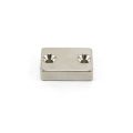 N42 Neodymium Countersunk Rectangular Magnet - 1-3/16 in. x 27/32 in. x 5/16 in. x 2 1/8 in. hole - 37.7lbs Pull Pull